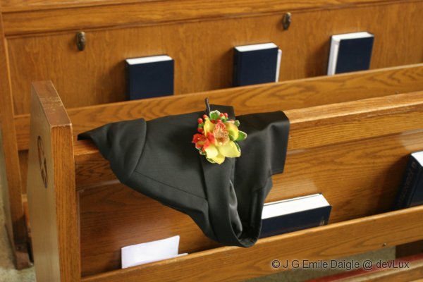 Groom's Tux on Pew